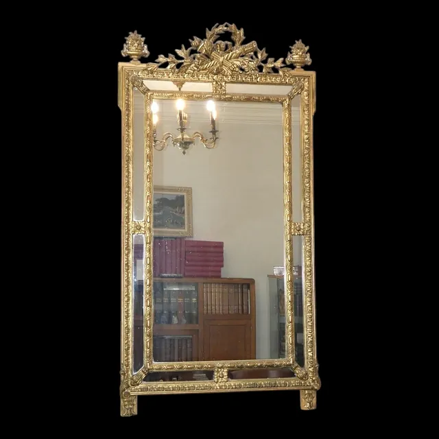 Grand miroir doré à parecloses style Louis XVI époque 19ème siècle