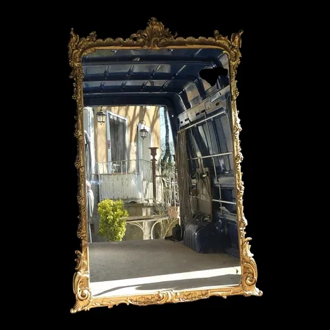 Grand miroir de boiserie fin 18ème début 19ème siècle