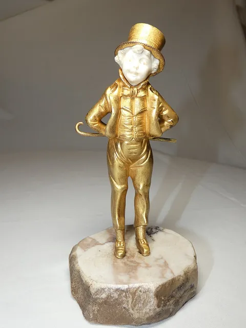 bronze doré chryséléphantine signé OMERTH